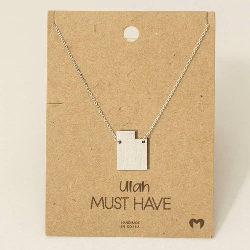 Necklace with a square pendant on a 'Utah MUST HAVE' card