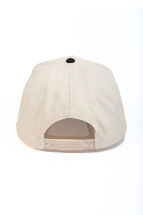 Beige baseball cap on a white background