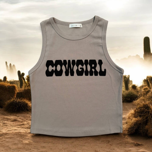 Tank top with words cowgirl on it with desert background
