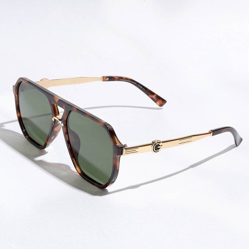 Sunglasses with tortoiseshell frame and gold accents on a white background