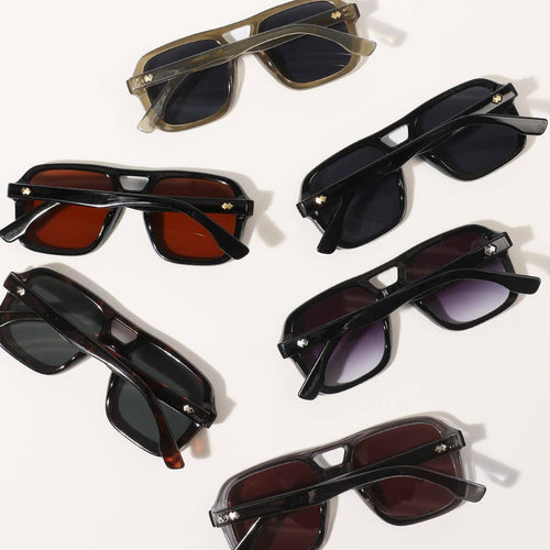 Collection of various sunglasses on a white background