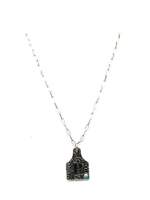 Cattle Tag Necklace with letter P. on it