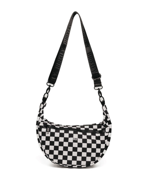 Black and white checkered bag with a strap on a white background