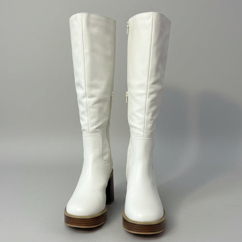 Pair of white knee-high boots on a gray background
