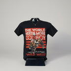 Black t-shirt with a graphic of a cowboy riding a bull and text 'The World Needs More Cowboy Wild West' on a white background.