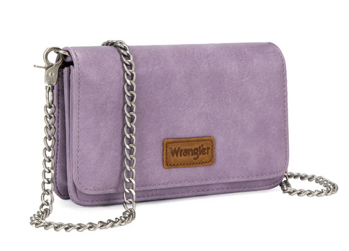 A purple faux-suede crossbody wallet featuring a silver-tone metal chain strap and a brown leather patch with the Wrangler logo, shown on a white background.