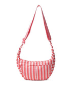 A pink and white vertically striped crescent-shaped shoulder bag with a matching adjustable shoulder strap, shown against a plain white background.