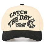 Beige and black hat that says "catch of the day" on a white background