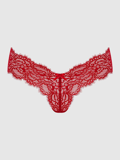 Red lace thong on a light gray background