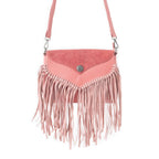 Pink fringed handbag on a white background