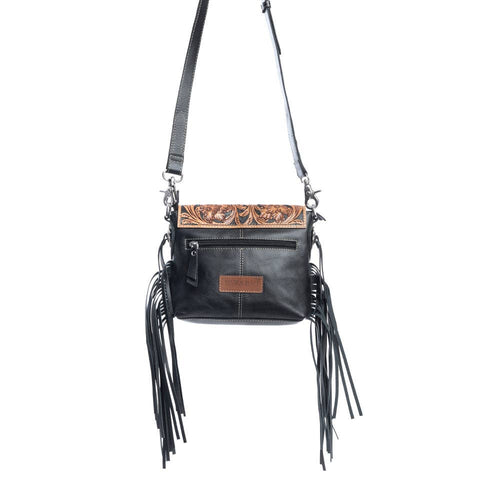 Black leather crossbody bag with fringe details on a white background