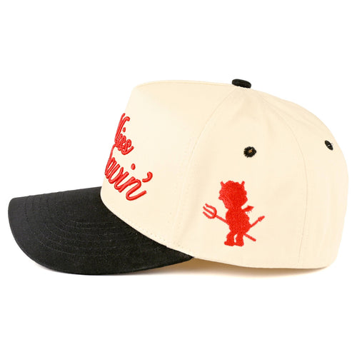 Two baseball caps, one black and one beige, with red text and graphics on a white background.