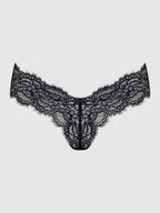 Black lace lingerie on a light gray background