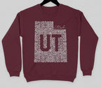 Maroon sweatshirt with 'UT' design on a hanger against a white background