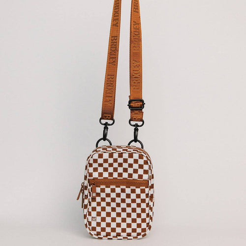 Checkered pouch with a brown strap on a light gray background