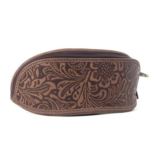 Brown leather pouch with intricate patterns on a white background