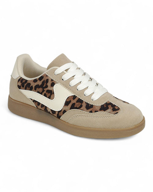 Beige sneaker with leopard print accents on a white background