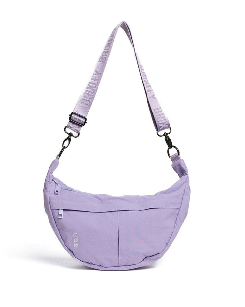 Purple shoulder bag with a strap on a white background