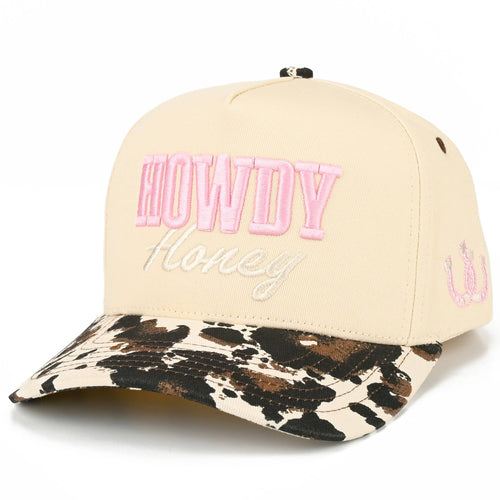 Beige cap with pink text 'HOWDY Honey' and leopard print brim on a white background