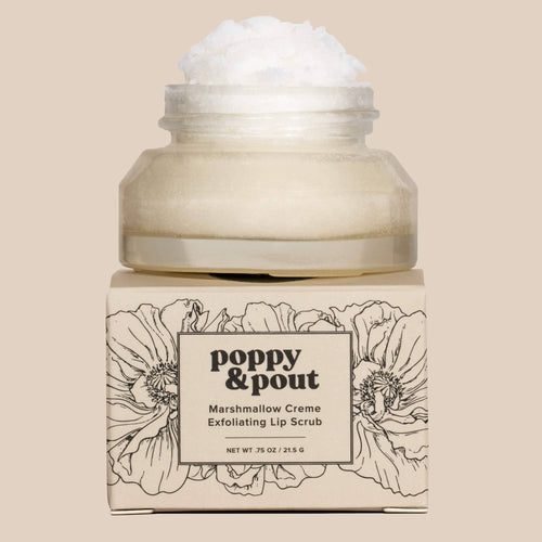 Jar of Poppy & Pout marshmallow crème exfoliating lip scrub on a beige background