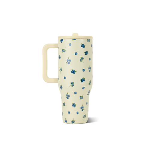 Cream-colored mug with blueberry pattern on a white background