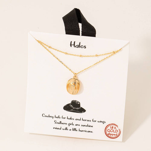 Gold necklace on a 'Halos' branded card with text and a black cowboy hat illustration.