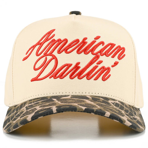 Beige cap with red 'American Darlin'' text and camouflage brim on a white background