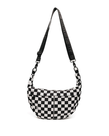 Black and white checkered bag with a strap on a white background