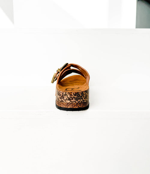 Brown cork sandal on a white background