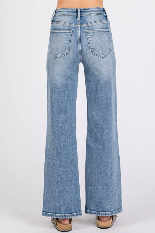 Light blue jeans on a white background