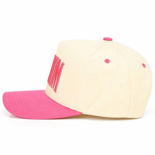 Beige and pink cap with text on a white background