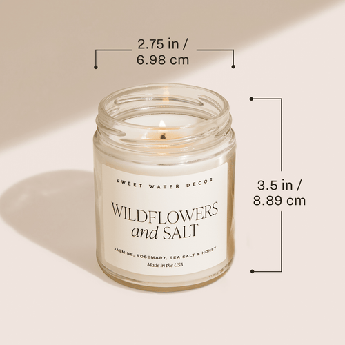 Candle in a glass jar with dimensions labeled on a beige background
