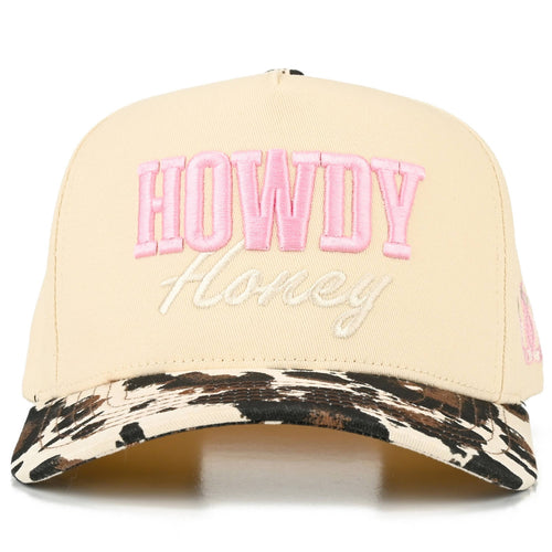 Beige cap with pink 'HOWDY' and white 'Honey' text, and camouflage brim on a white background