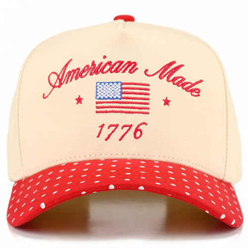 Beige cap with red and white pattern, American flag, and 'American Made 1776' text on a white background