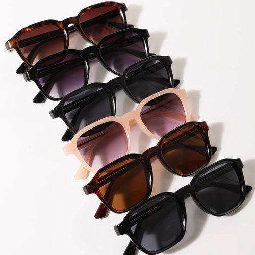 Set of sunglasses with different frame colors and lens tints on a white background