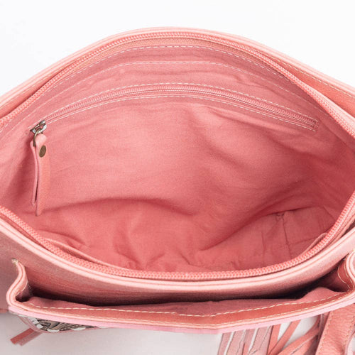 Close-up of a pink handbag with a zipper on a white background