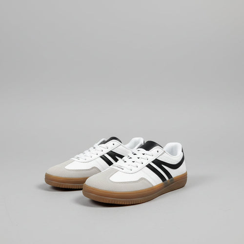 White sneakers with black and tan accents on white background 