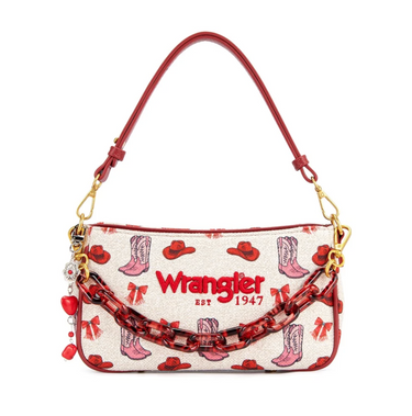 Wrangler handbag featuring a cream canvas body with a red and pink cowboy boot and hat pattern, a red leather shoulder strap, and a chunky red translucent chain strap across the front.
