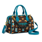 A Wrangler handbag with a brown coated canvas body featuring a western print of cowboy hats, boots, and the brand name 'Wrangler Est.' in teal and gold, with teal leather handles, a teal shoulder strap, and a chunky black chain detail.
