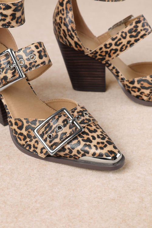 Leopard print shoes with buckles on a beige background