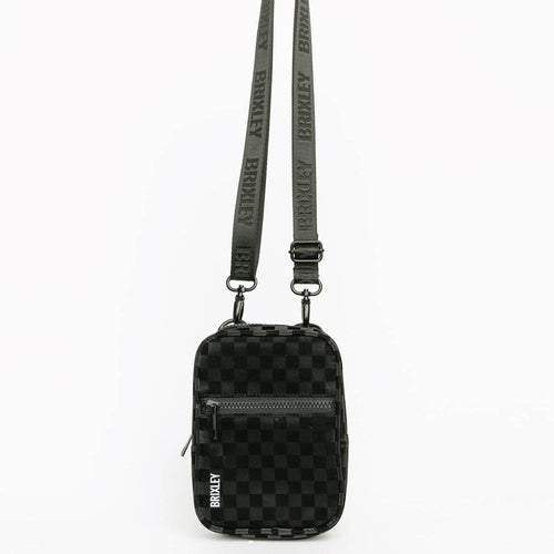 Black checkered crossbody bag with a strap on a white background