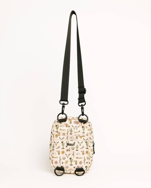 Small crossbody bag with a pattern on a white background