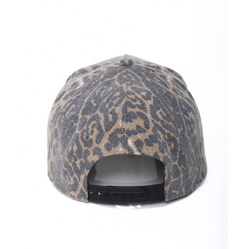 Leopard print cap on a white background