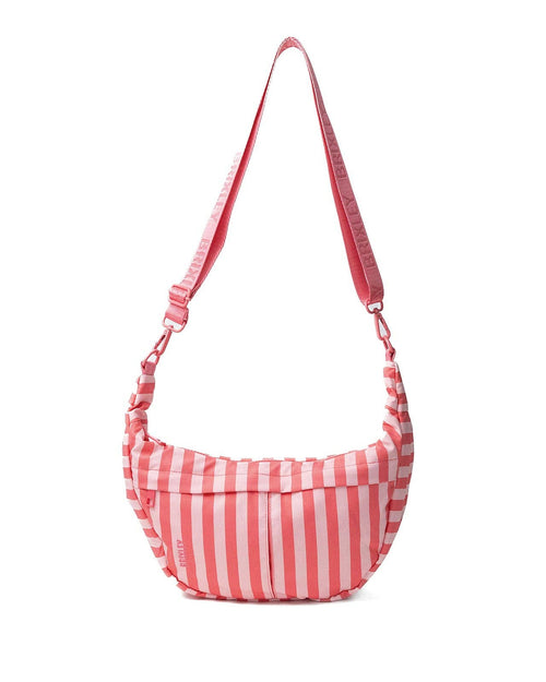 A pink and white vertically striped crescent-shaped shoulder bag with a matching adjustable shoulder strap, shown against a plain white background.