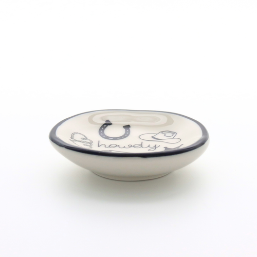 Ceramic bowl with 'howdy' and horseshoe design on a white background