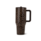 A tall travel tumbler with a brown and black leopard print pattern, featuring a dark brown handle and lid, shown on a clean white background.
