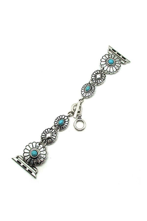 Silver bracelet with turquoise stones on a white background