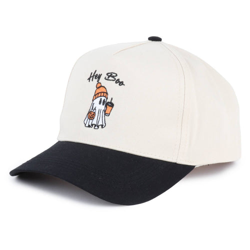 A baseball cap with an off-white crown and a black curved brim, featuring a cartoon ghost holding a pumpkin and drink with the text 'Hey Boo' embroidered on the front.