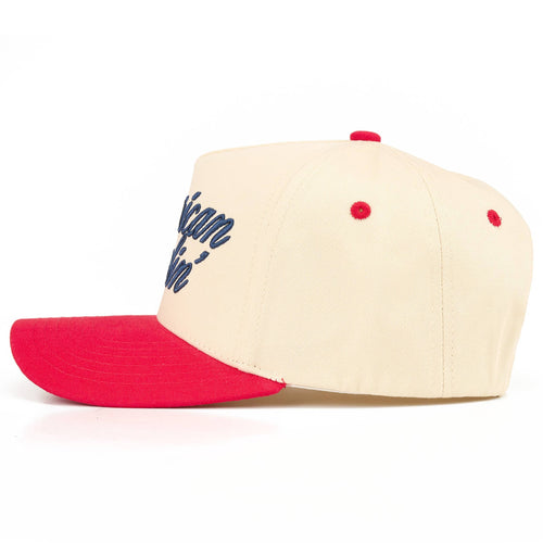 Beige and red cap with text on a white background