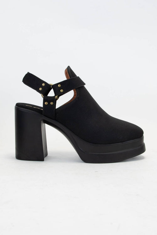 Black platform clog shoe on a white background
